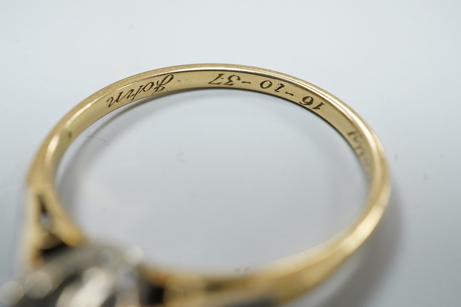 A diamond ring, mid 20th century, claw-set with a circular-cut diamond weighing approximately 0.50 carats, to shoulders set with single-cut diamonds, mounted in gold, size O, inscribed 'Molly 16-10-37 John', gross weight